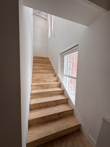 New stairwell dry walled (Feb 2026)