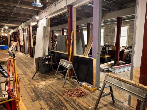 Classroom framed ready for glass and metal accents (Apr 2026)